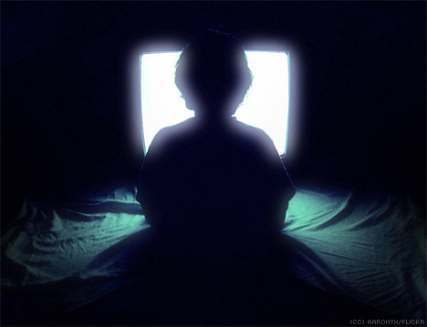 child-watching-television-silhouette